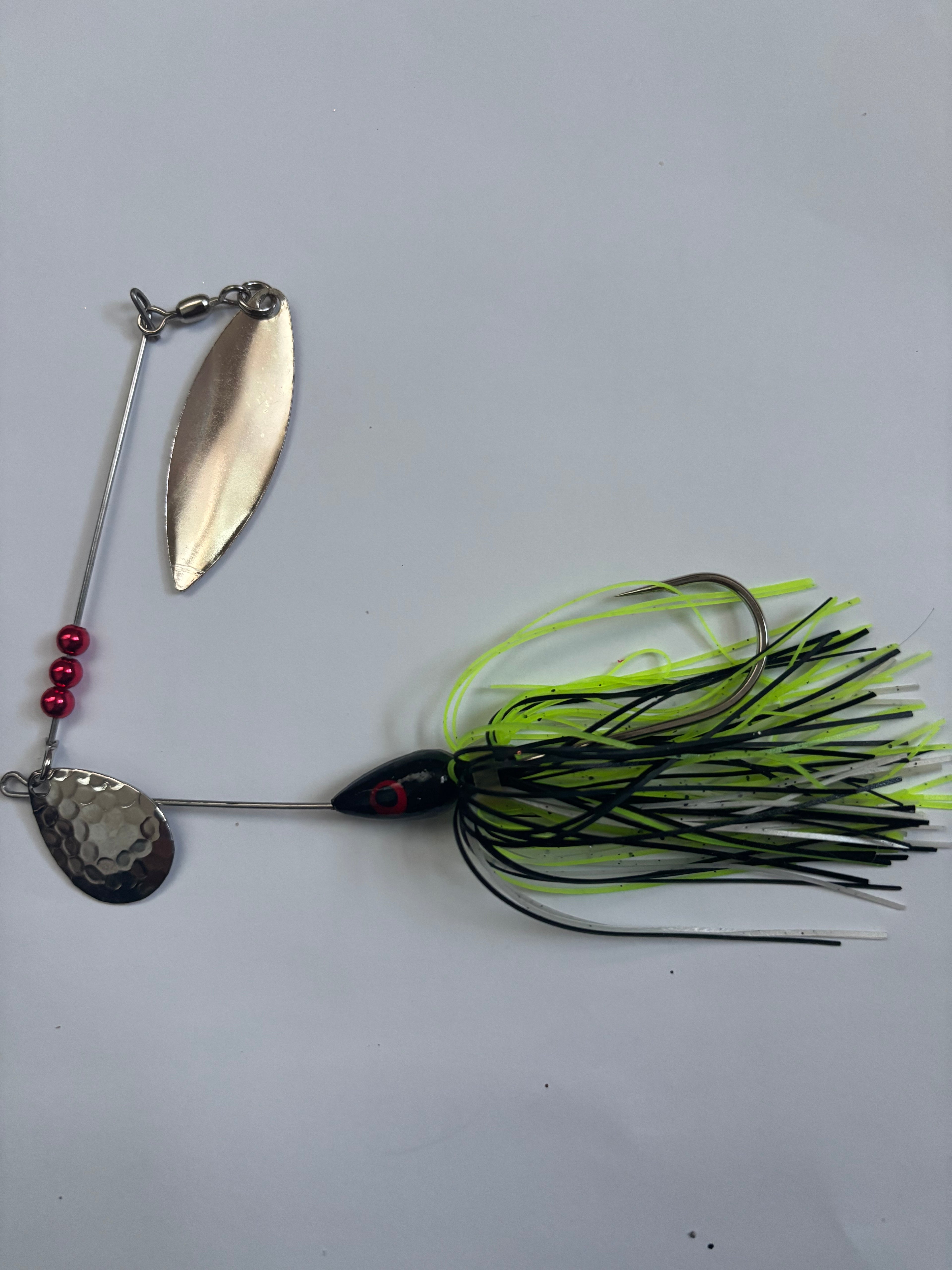 Black Bass Spinner (with dark chartreuse mix skirt)